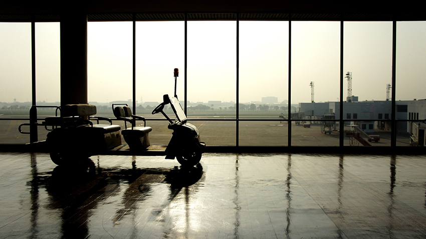 golf car 1052485 1920. Security car shuttle vehicle park inside of an airport terminal. 